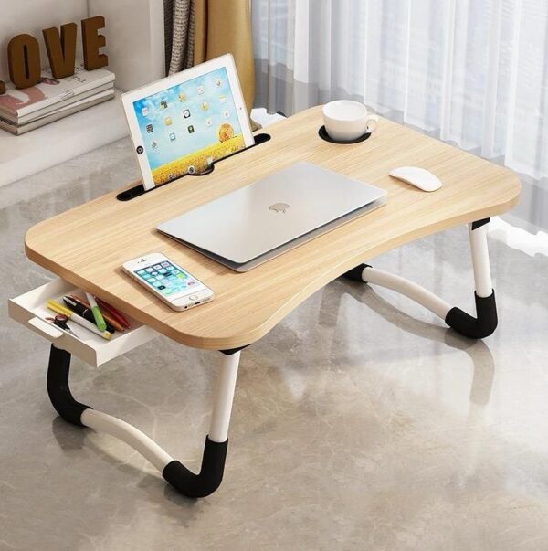Adjustable and foldable laptop table